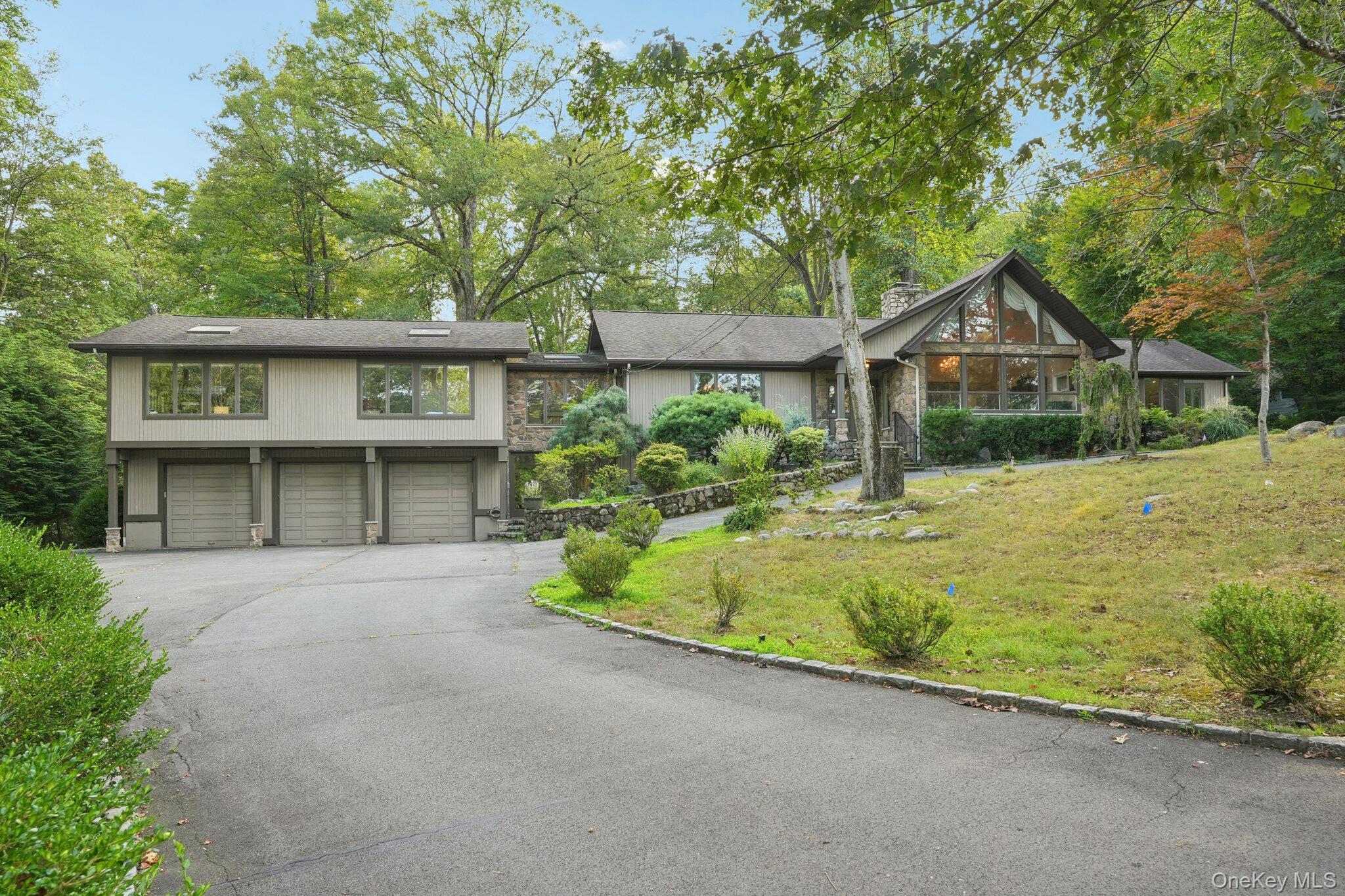 11 Old Phillips Hill Road New City, NY 10956 - Photo 39 of 42 front view of a house with a yard