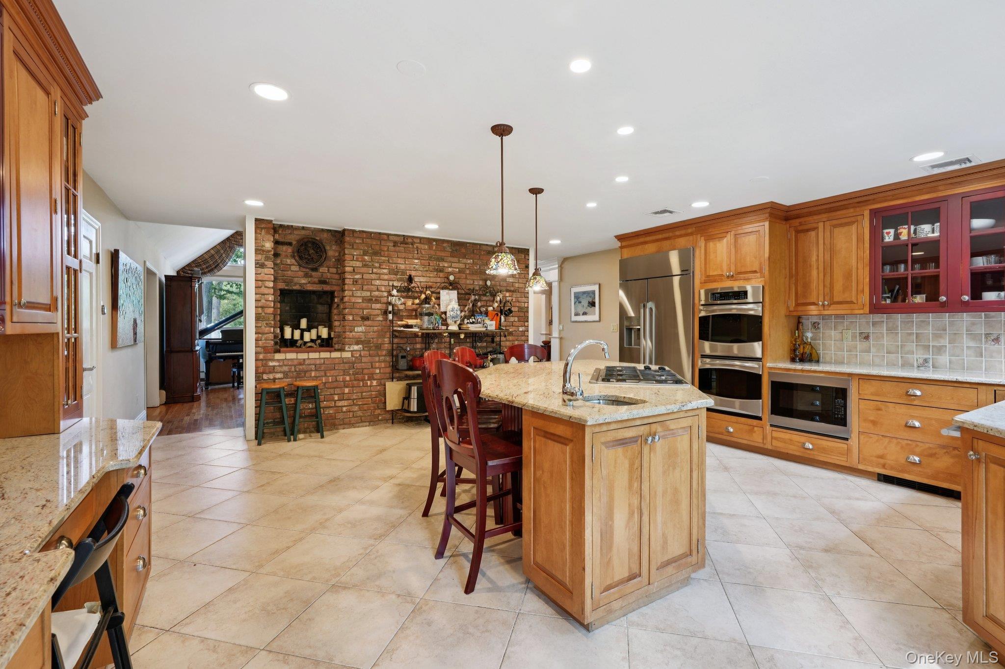 11 Old Phillips Hill Road New City, NY 10956 - Photo 7 of 42 a kitchen with stainless steel appliances kitchen island granite countertop a stove and a sink