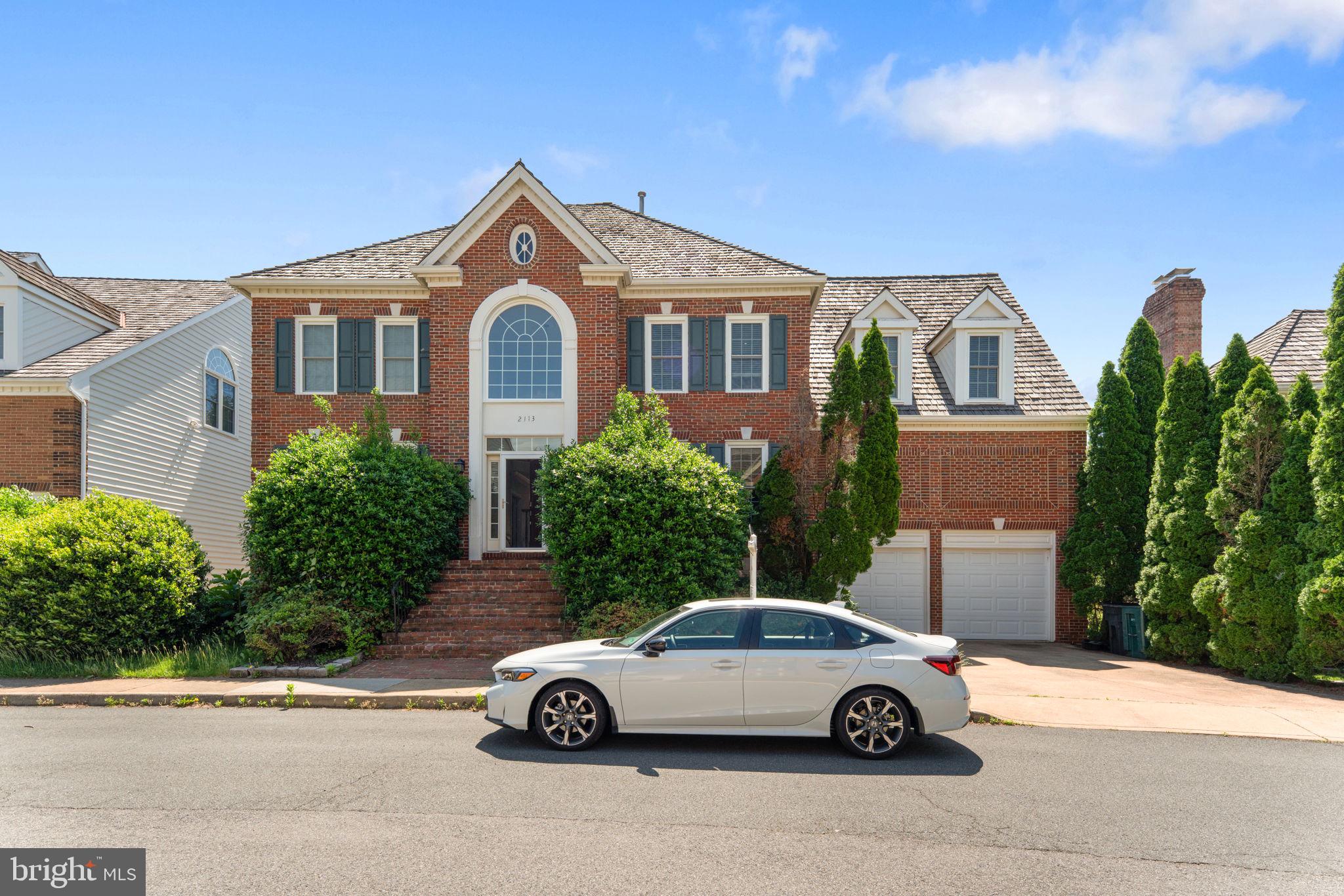 a car parked in front of a house