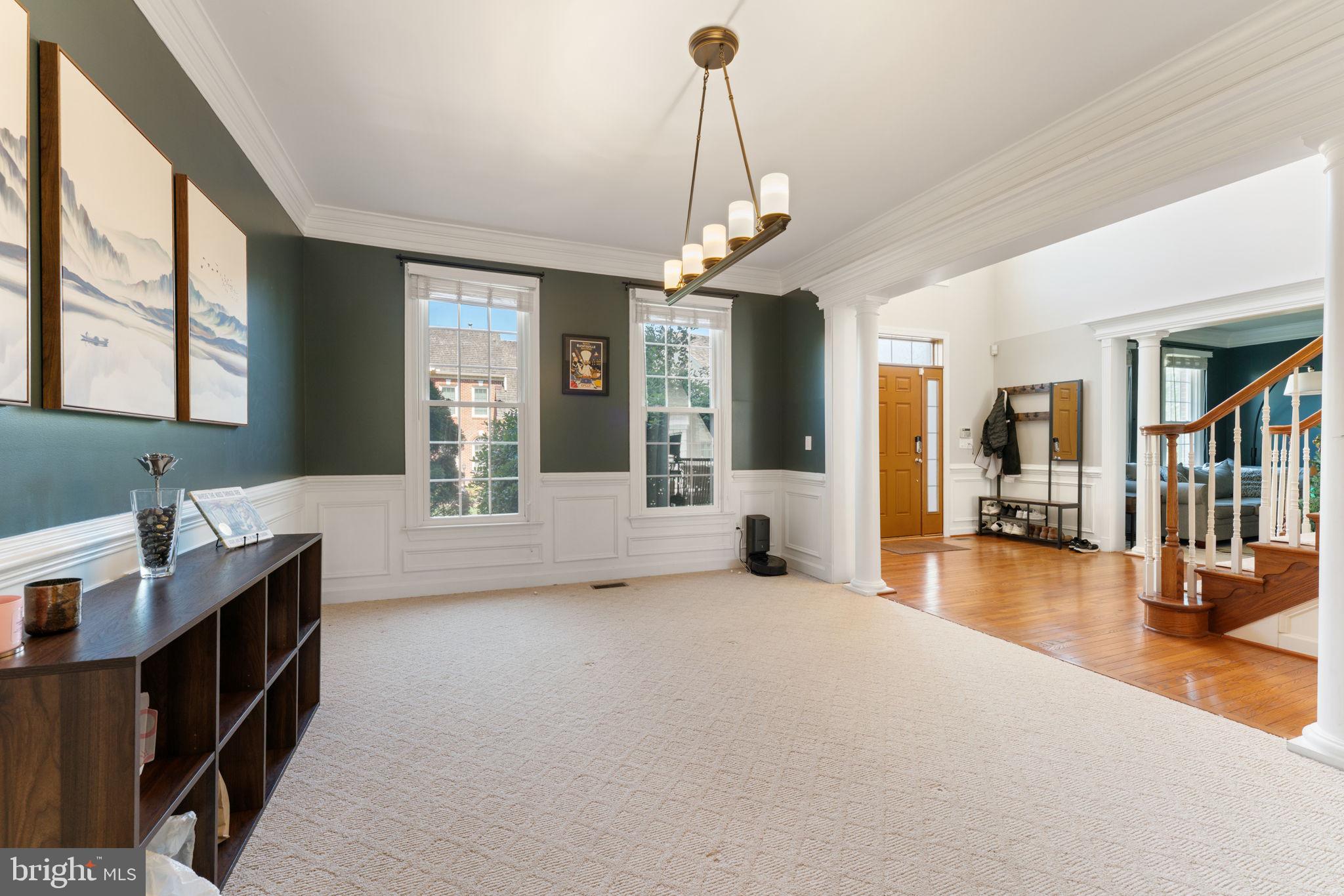 2113 Arrowleaf Drive Vienna, VA 22182 - Photo 14 of 40 a living room with furniture and large windows