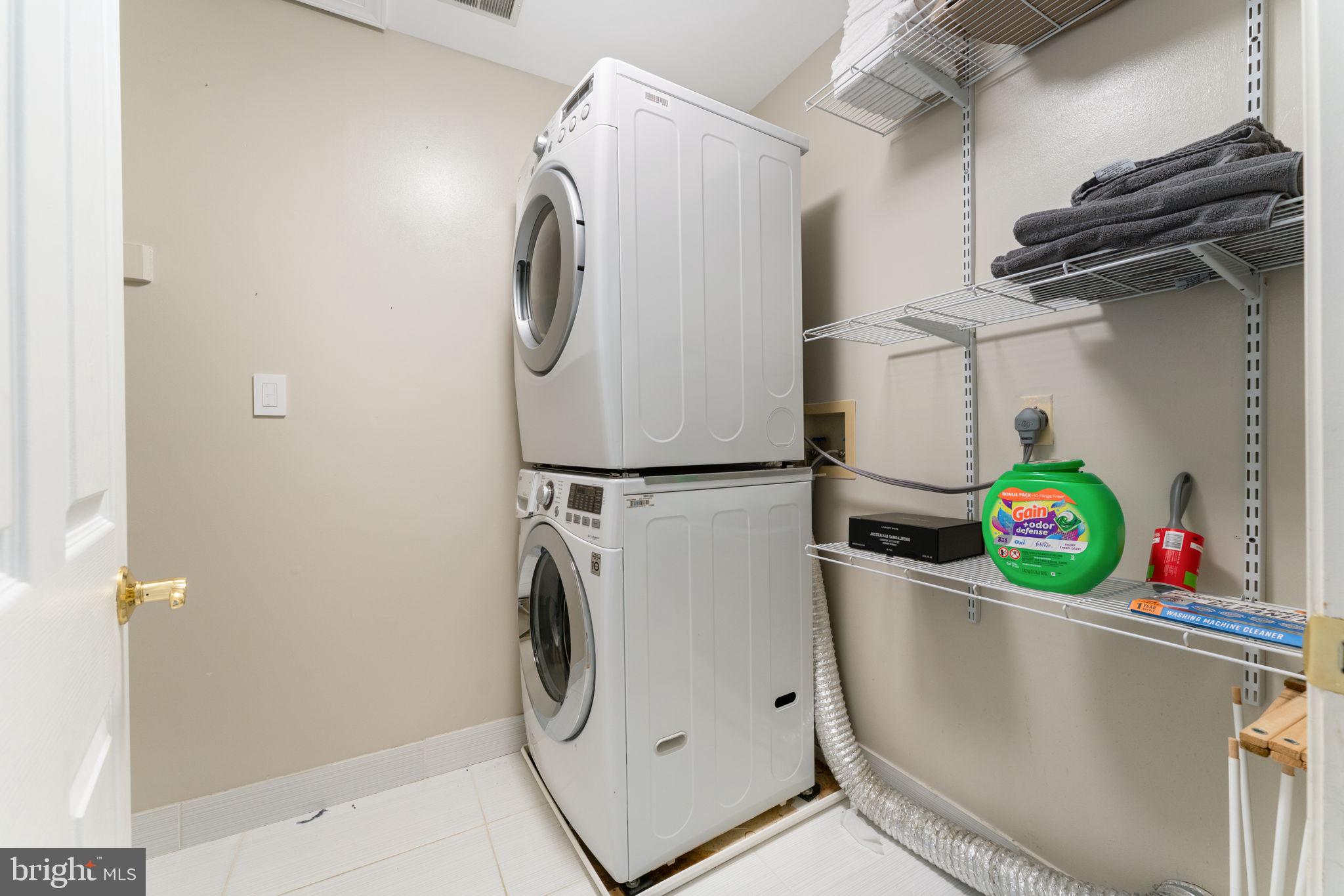 2113 Arrowleaf Drive Vienna, VA 22182 - Photo 21 of 40 a utility room with dryer and washer
