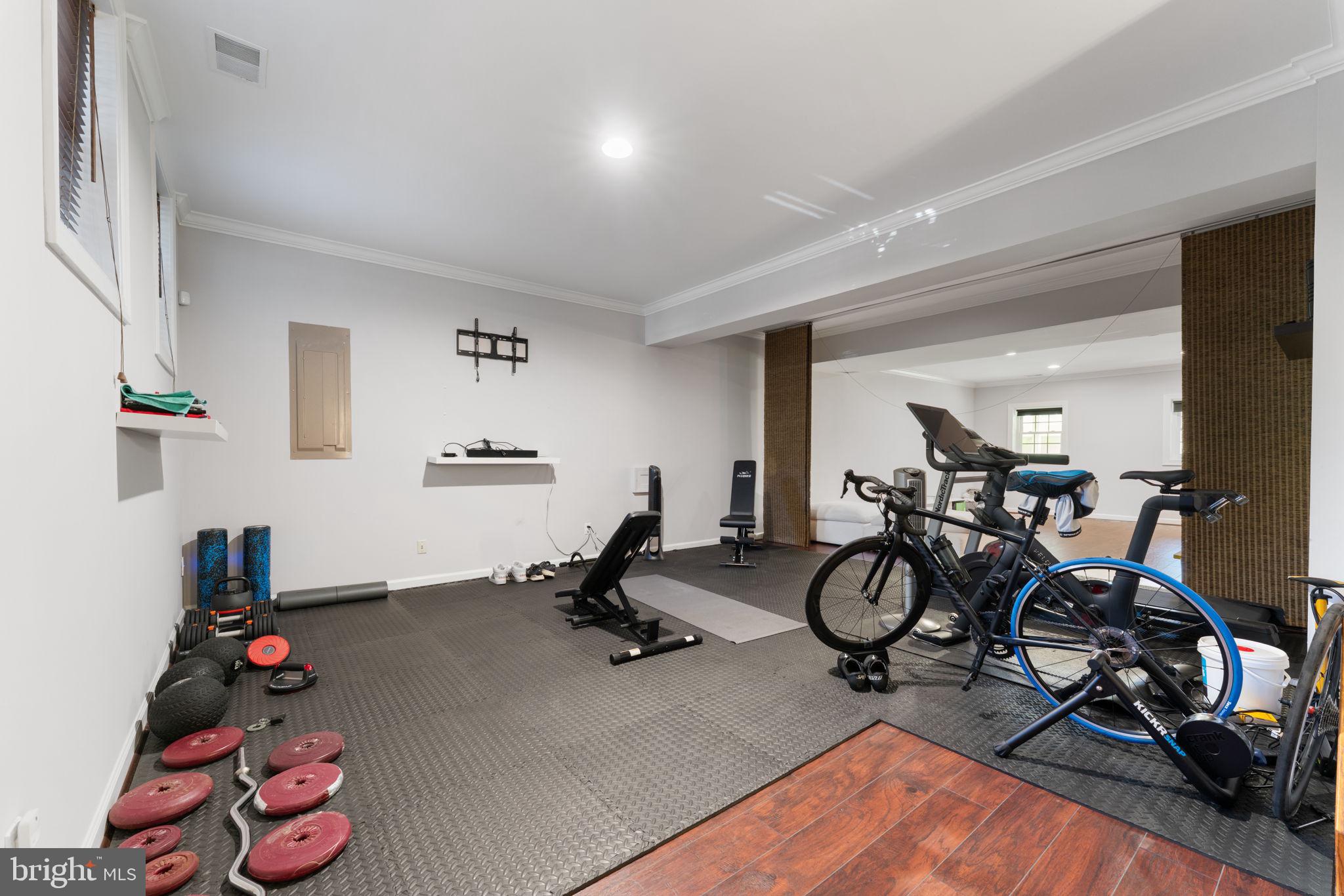 2113 Arrowleaf Drive Vienna, VA 22182 - Photo 27 of 40 a view of a room with gym equipment