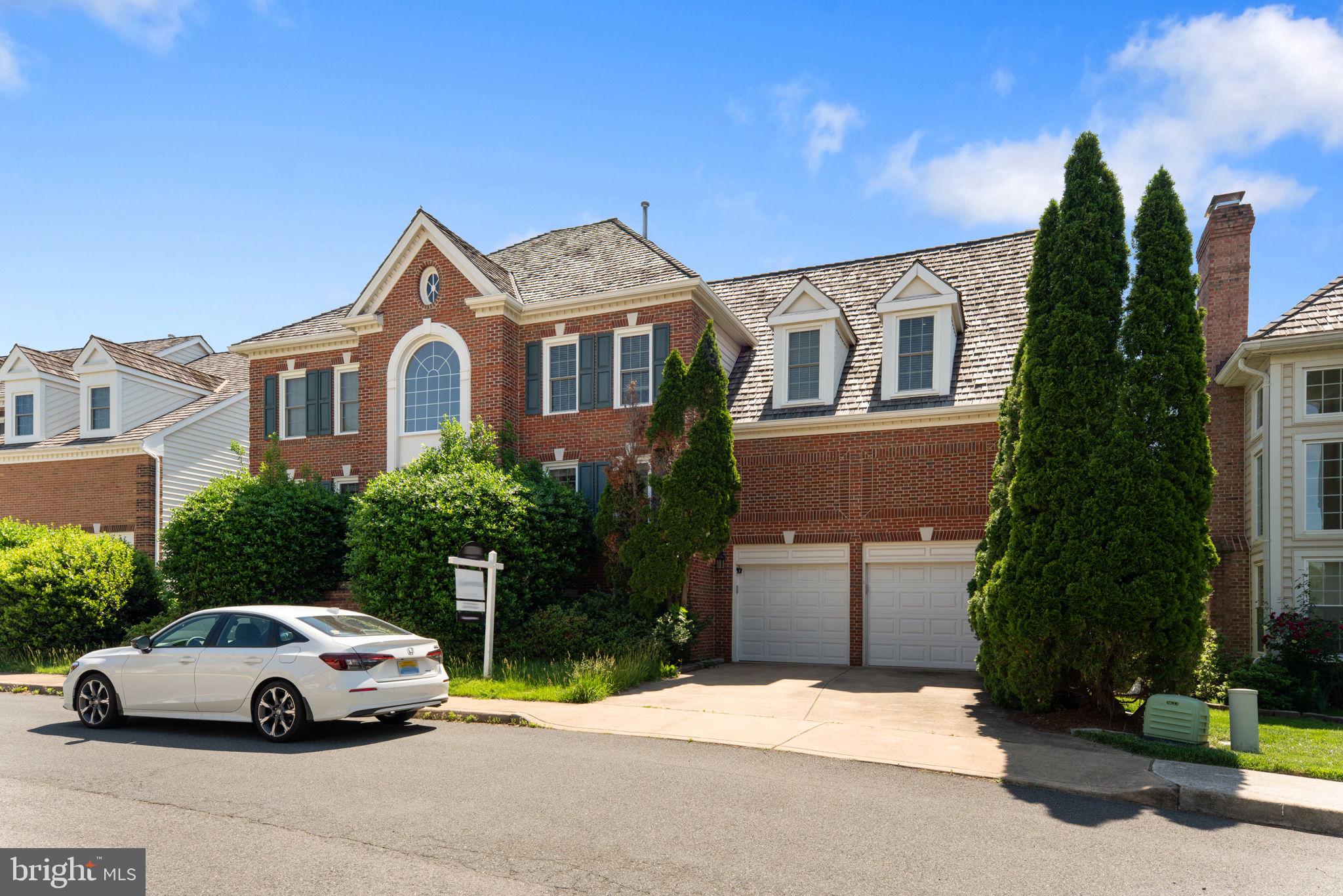 2113 Arrowleaf Drive Vienna, VA 22182 - Photo 3 of 40 a car parked in front of a house
