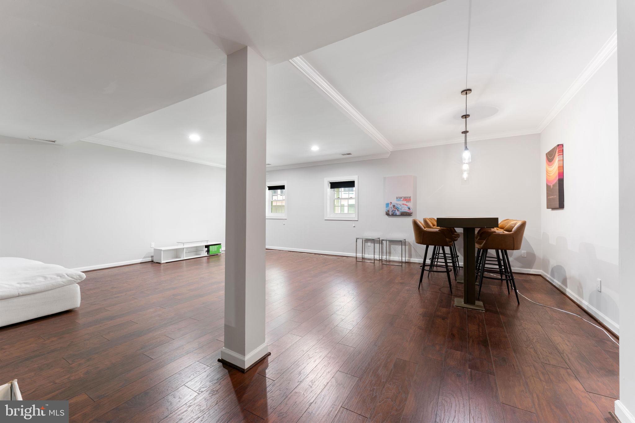 2113 Arrowleaf Drive Vienna, VA 22182 - Photo 31 of 40 a view of a livingroom with furniture and wooden floor