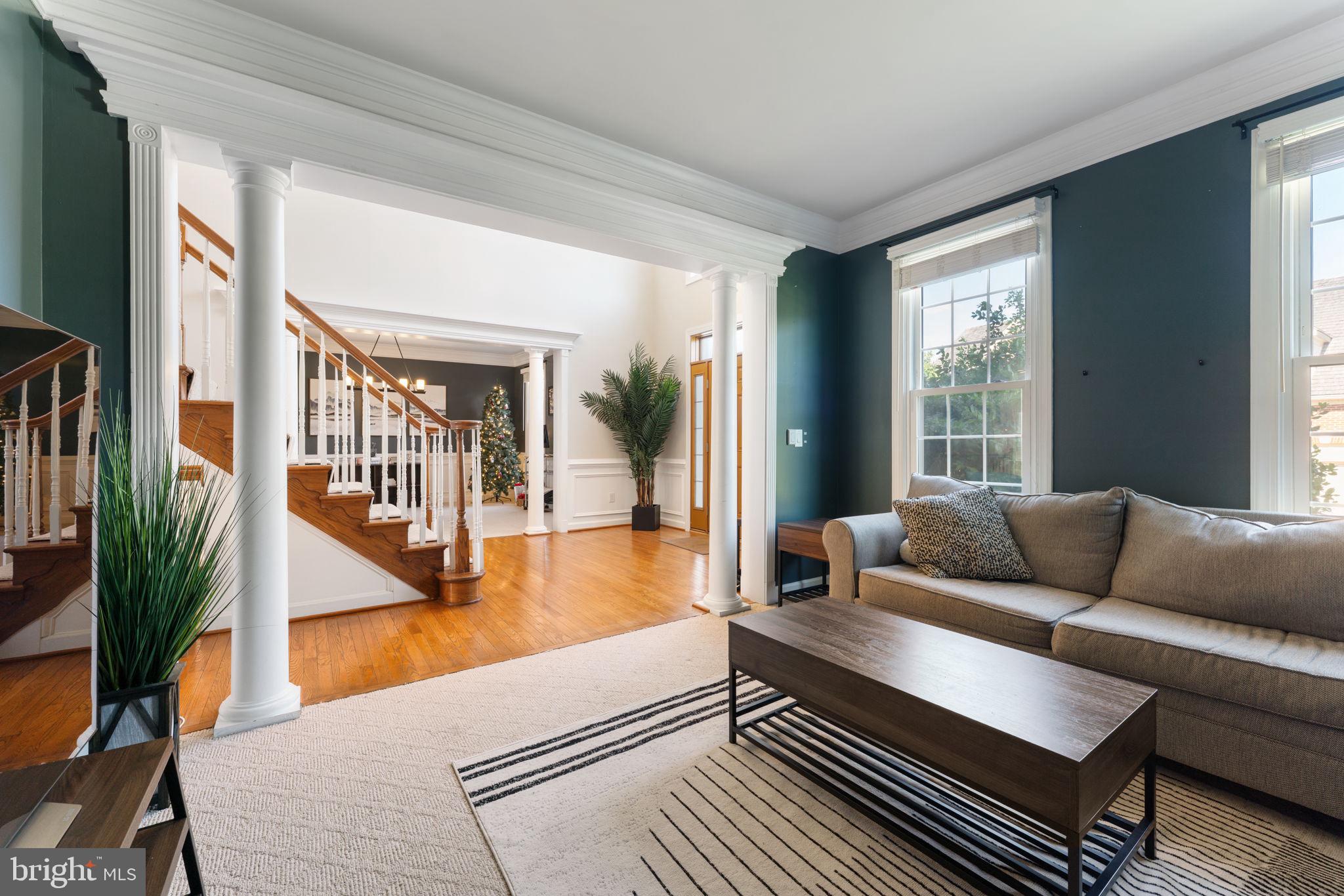 2113 Arrowleaf Drive Vienna, VA 22182 - Photo 5 of 40 a living room with furniture and a large window