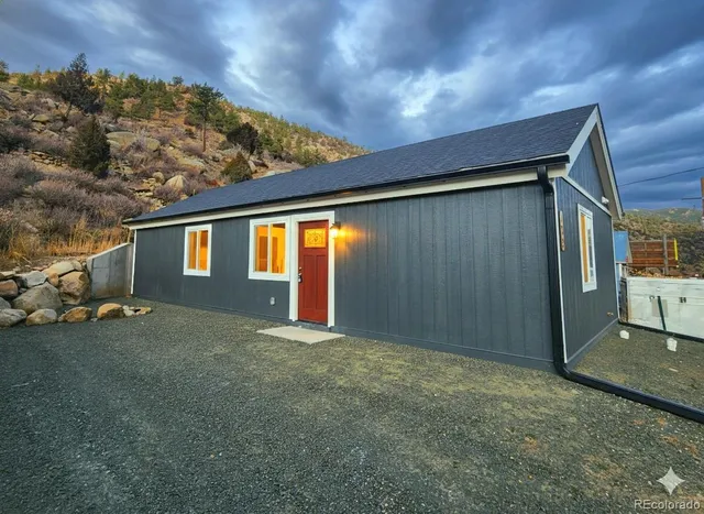 a view of backyard of a house