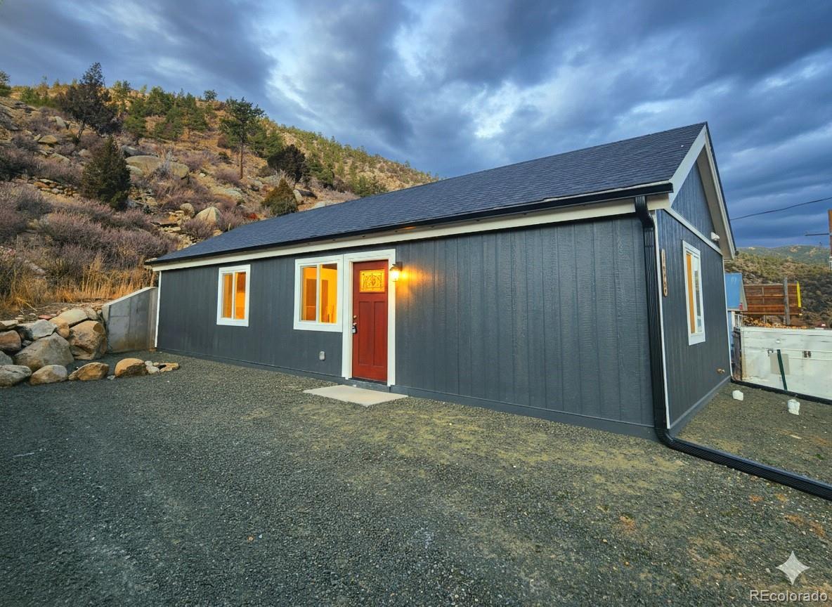 a view of backyard of a house