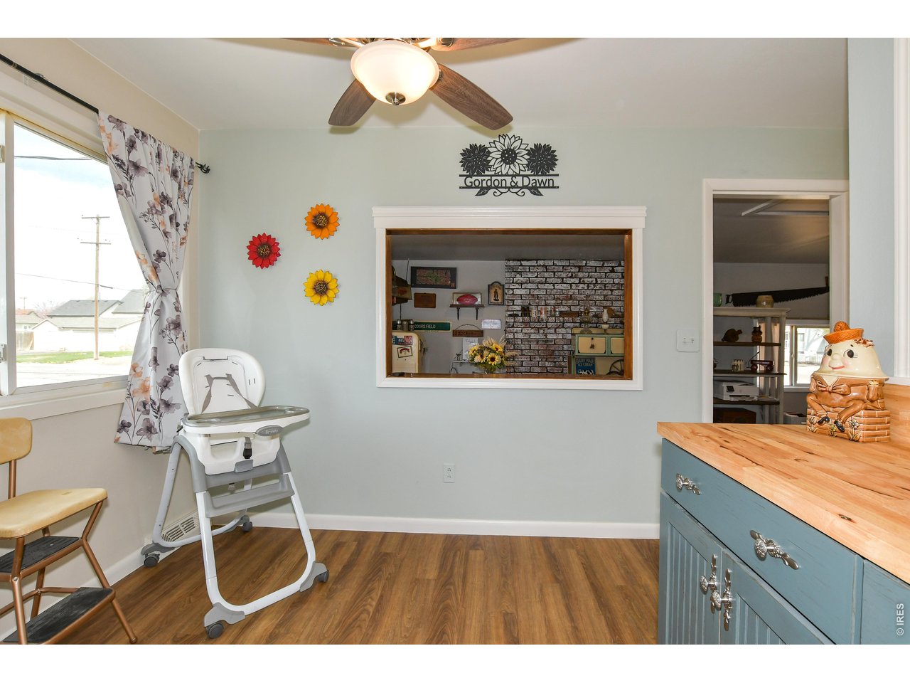 207 3rd Street Kersey, CO 80644 - Photo 15 of 41 Open window to bonus rooms could be dining area or office or family room or?