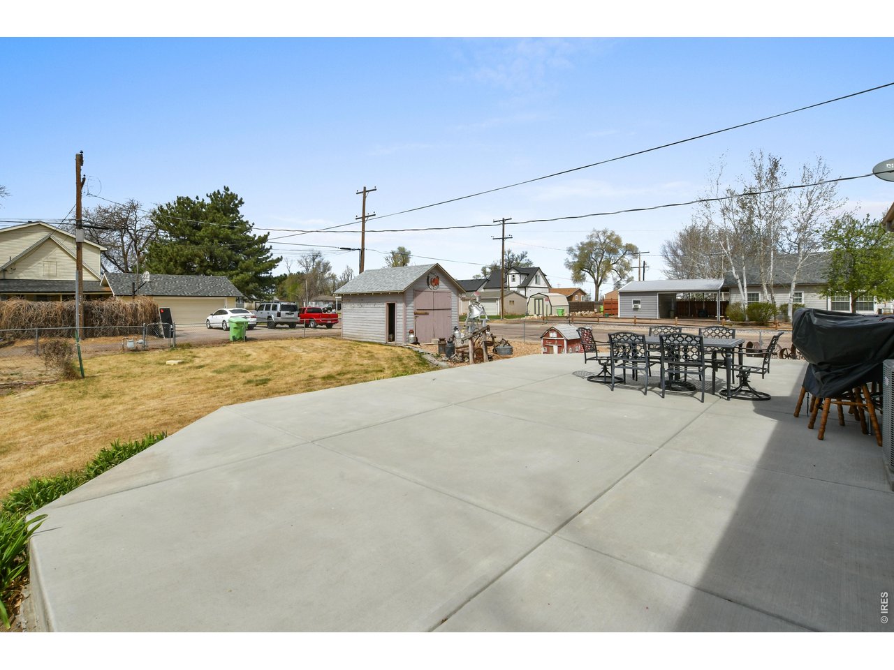 207 3rd Street Kersey, CO 80644 - Photo 40 of 41 Some patio furniture stays for you