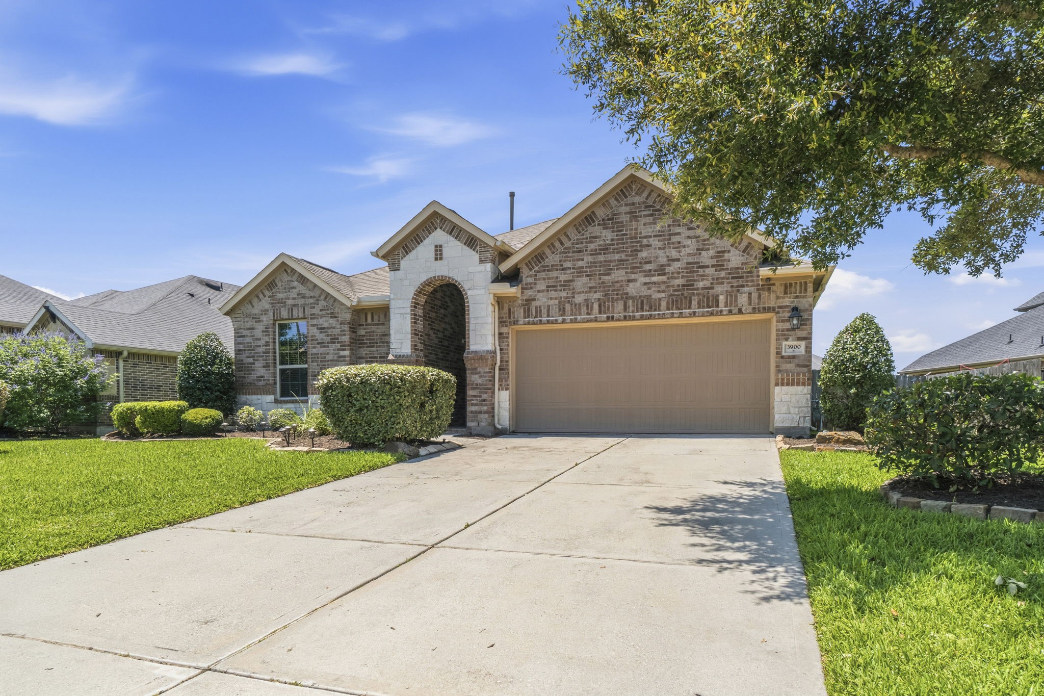 3900 Enchanted Timbers Lane Spring, TX 77386 - Photo 3 of 49 a front view of a house with garden