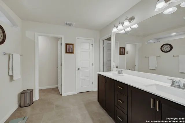 a view of a hallway with rack on the wall