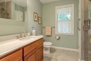 51 Tracey Cove Circle Rome, ME 04963 - Photo 15 of 25 a bathroom with a sink and a toilet