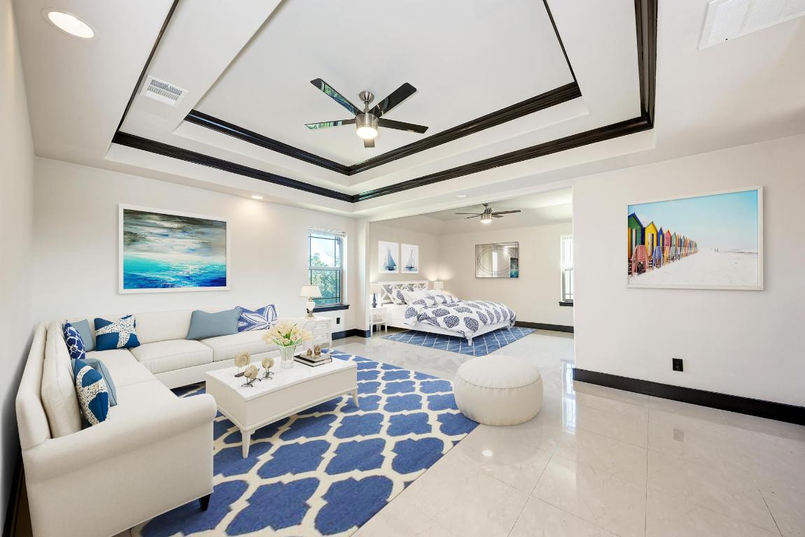 104 Spring Valley Street Hutto, TX 78634 - Photo 21 of 40 a living room with furniture and a large window