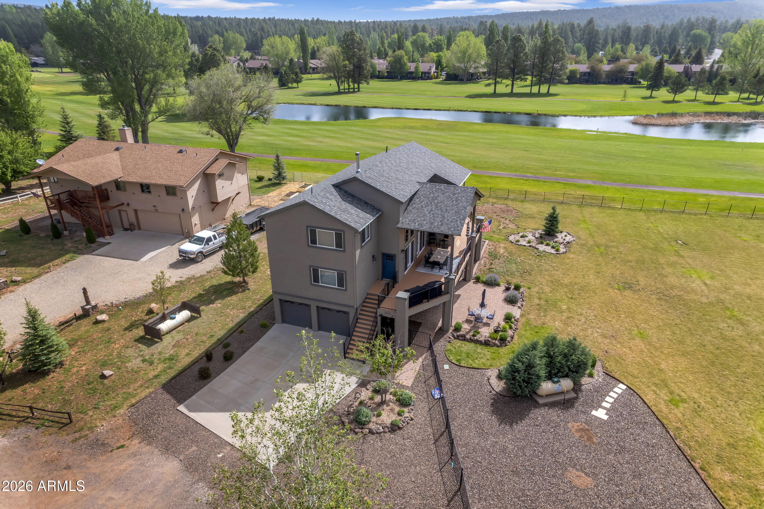 17975 Hopi Road Munds Park, AZ 86017 - Photo 51 of 58 an aerial view of a house with a big yard