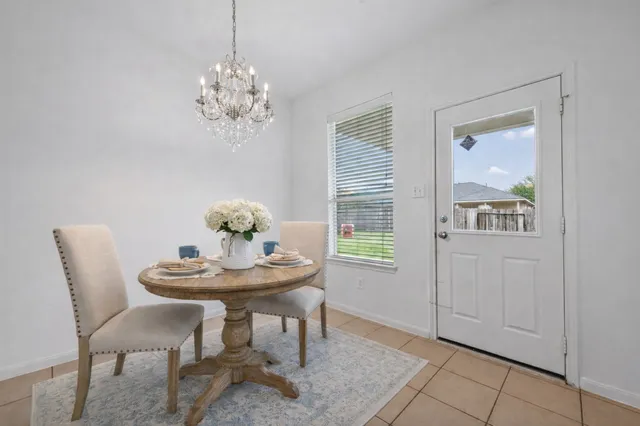 a kitchen with stainless steel appliances granite countertop a sink stove and microwave