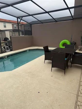 a workspace with furniture and a window