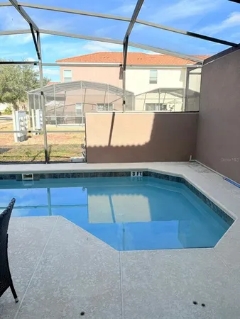 a view of a living room and window