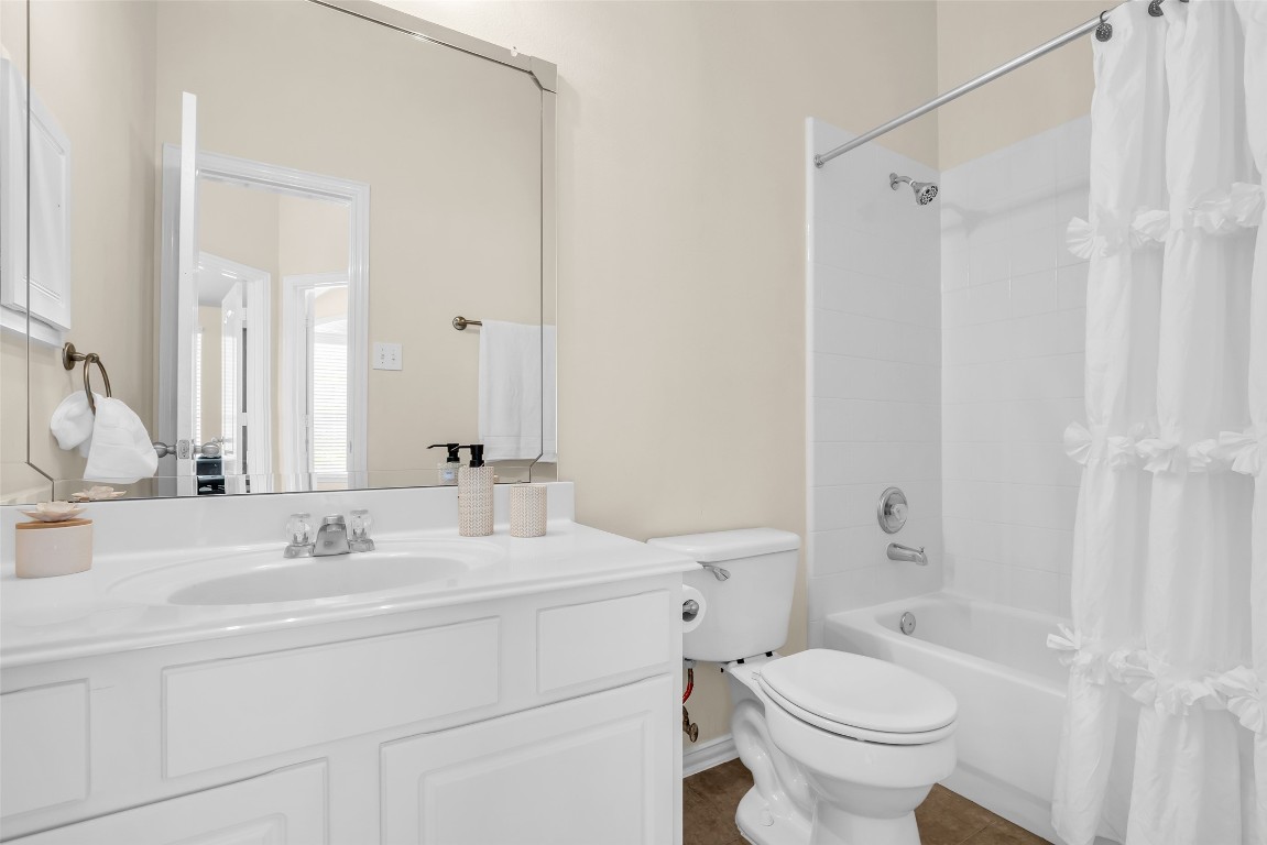 10022 Darrell Springs Lane Tomball, TX 77375 - Photo 17 of 27 a bathroom with a sink toilet and shower