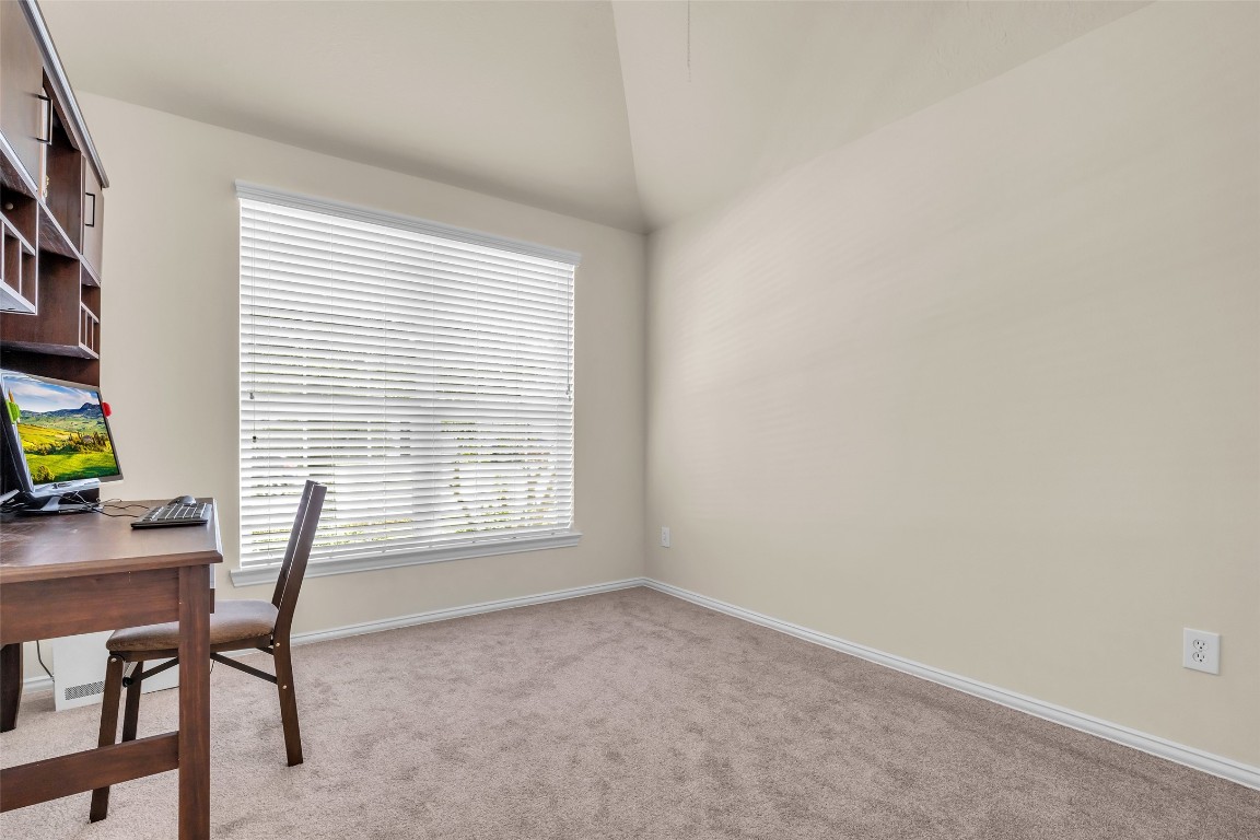 10022 Darrell Springs Lane Tomball, TX 77375 - Photo 18 of 27 a workspace with furniture and a window