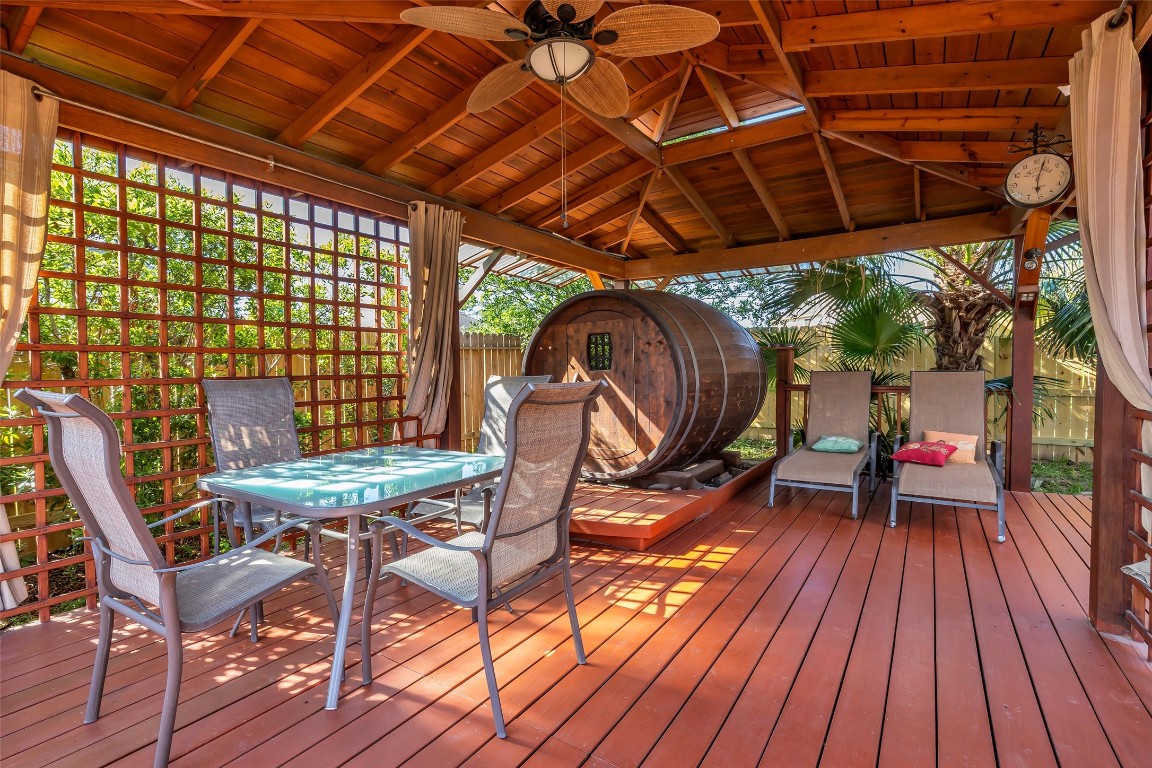10022 Darrell Springs Lane Tomball, TX 77375 - Photo 19 of 27 a view of a chairs and table on the deck