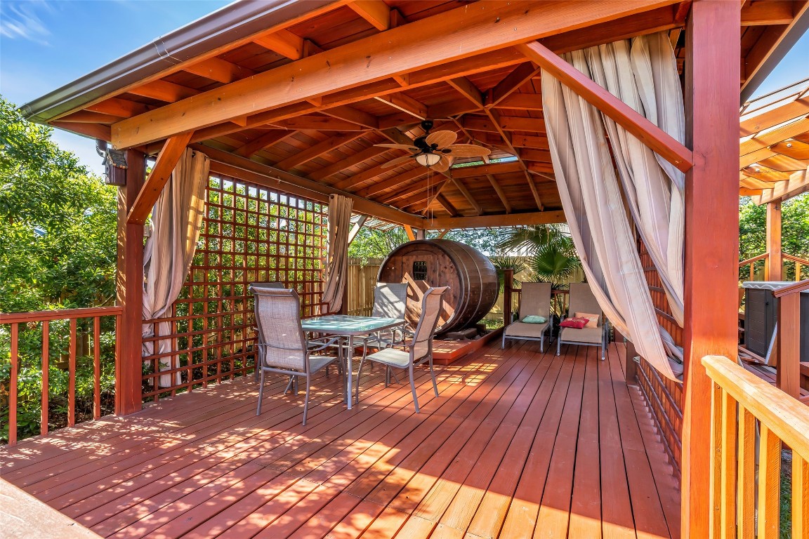 10022 Darrell Springs Lane Tomball, TX 77375 - Photo 20 of 27 a view of outdoor space with wooden floor and furniture