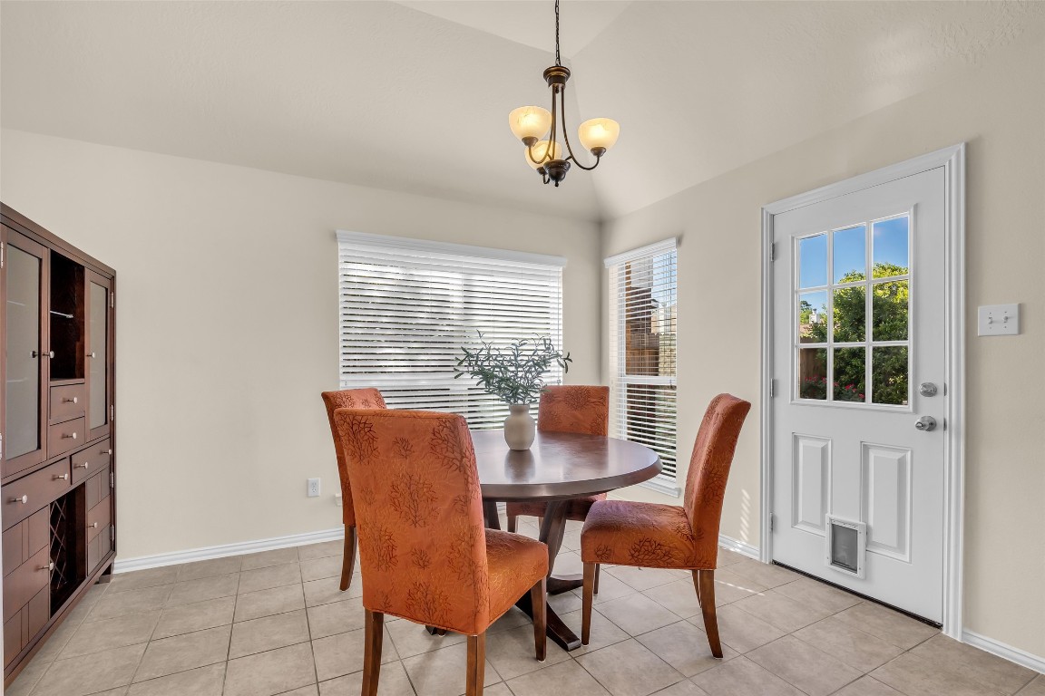 10022 Darrell Springs Lane Tomball, TX 77375 - Photo 8 of 27 a view of a dining room with furniture window and outside view