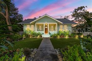 324 Julia Place Sarasota, FL 34236 - Photo 1 of 52 a front view of a house with garden