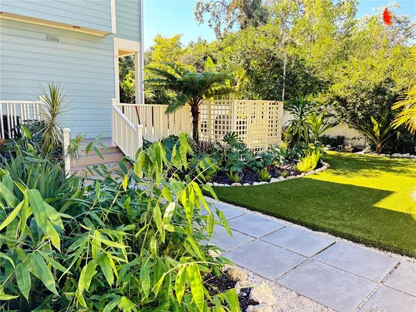 a view of a back yard of the house