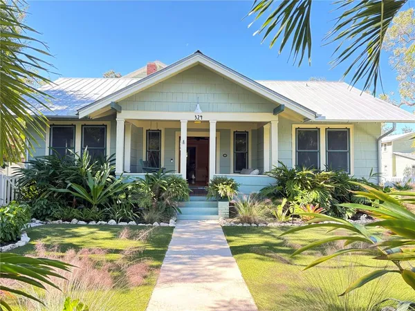 a view of a house with swimming pool