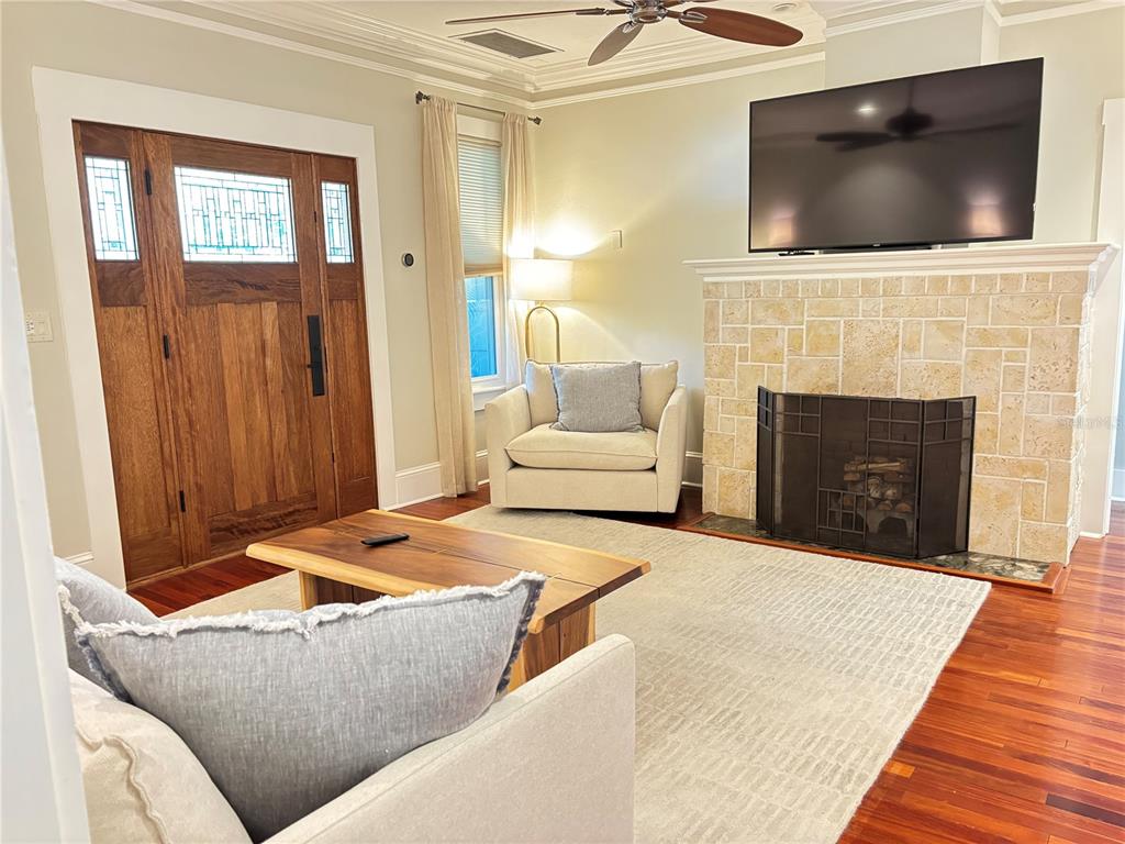 324 Julia Place Sarasota, FL 34236 - Photo 28 of 52 a living room with furniture and a fireplace