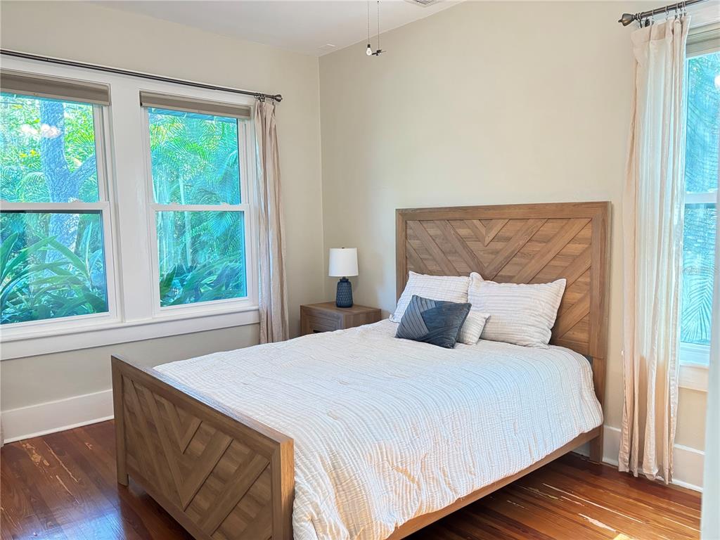 324 Julia Place Sarasota, FL 34236 - Photo 43 of 52 a large bed sitting in a bedroom next to a window