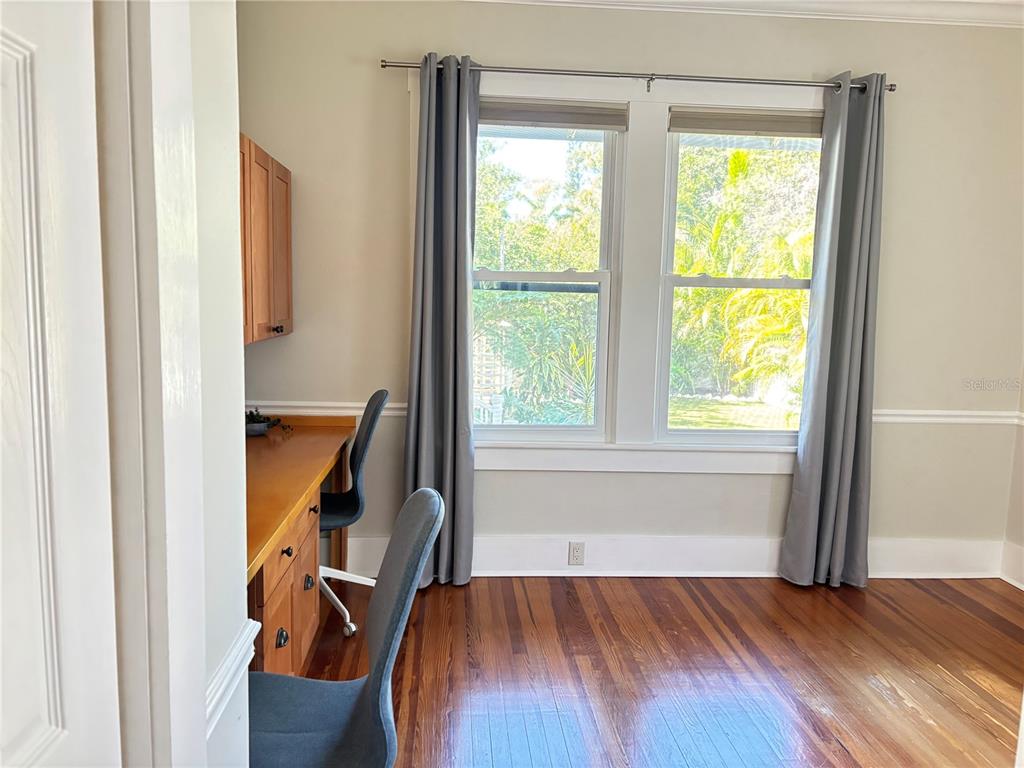 324 Julia Place Sarasota, FL 34236 - Photo 47 of 52 a view of a room with wooden floor and a window