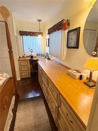 a kitchen with a sink and a stove top oven