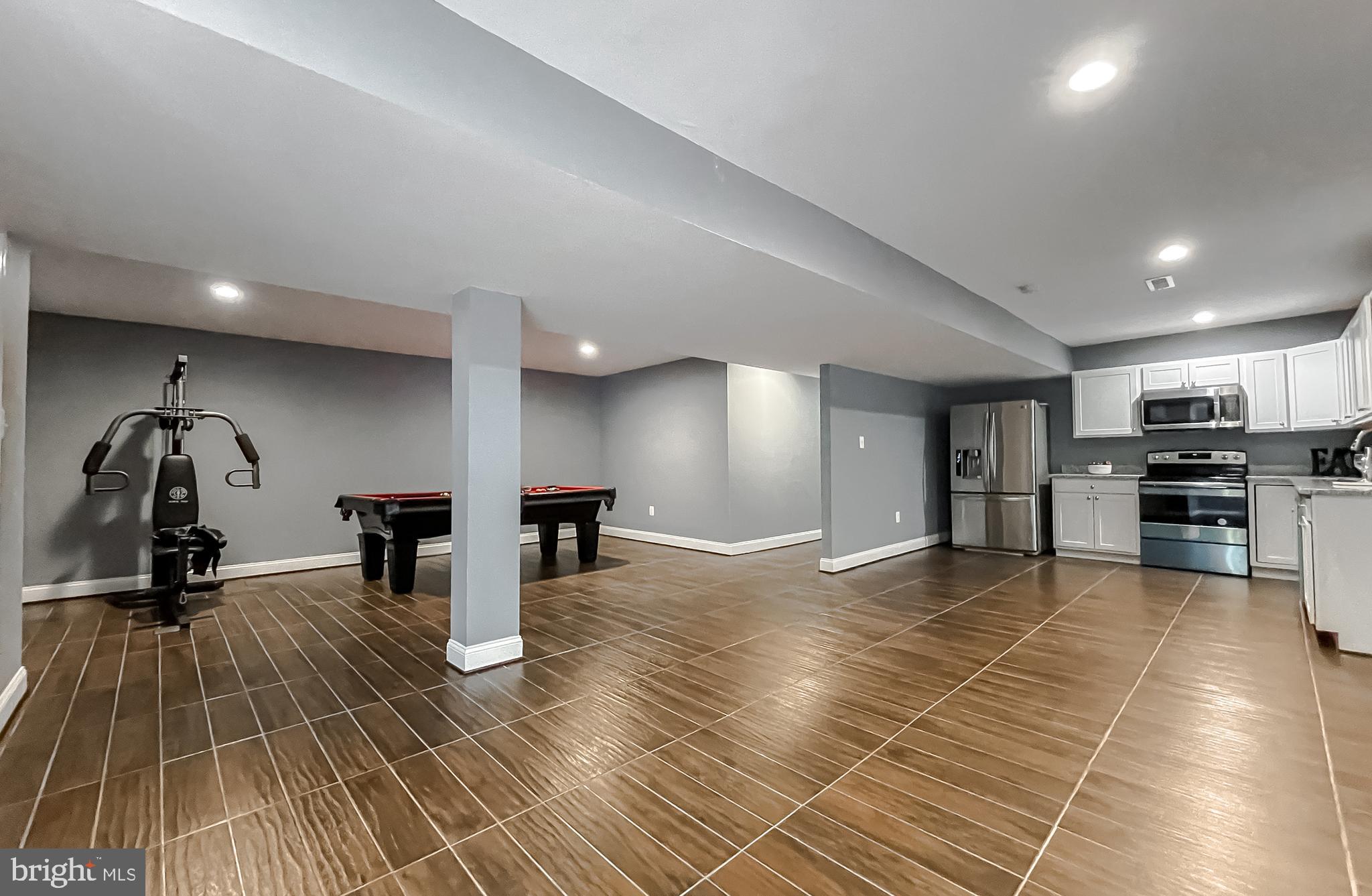 2711 Enterprise Road Bowie, MD 20721 - Photo 47 of 56 Large rec room with full kitchen