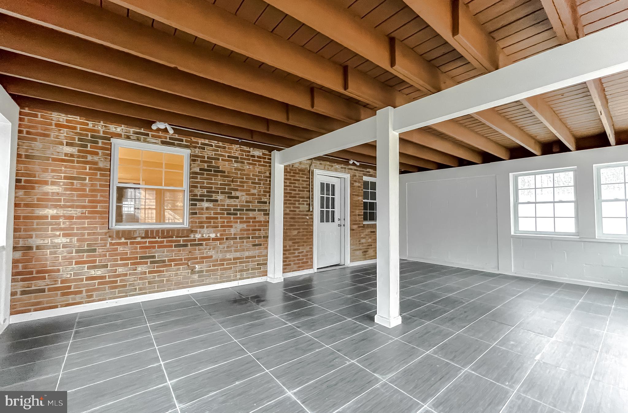 2711 Enterprise Road Bowie, MD 20721 - Photo 51 of 56 Enclosed porch under deck