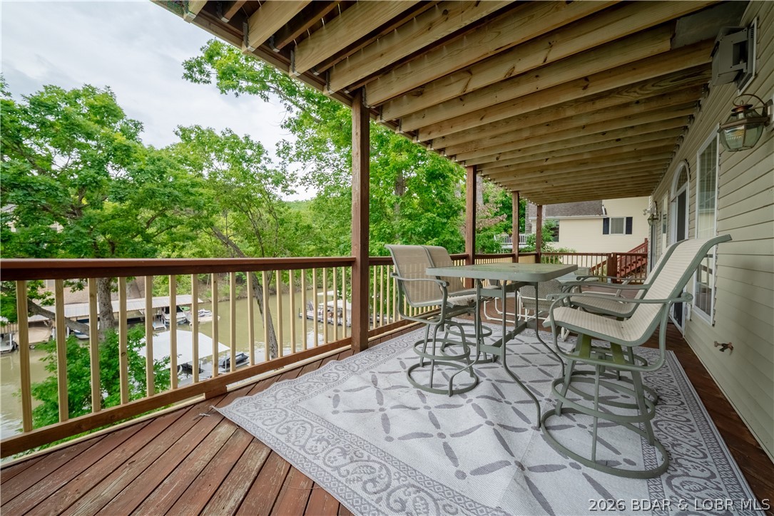 2247 Breezy Acres Road Osage Beach, MO 65065 - Photo 36 of 53 Lower deck covered