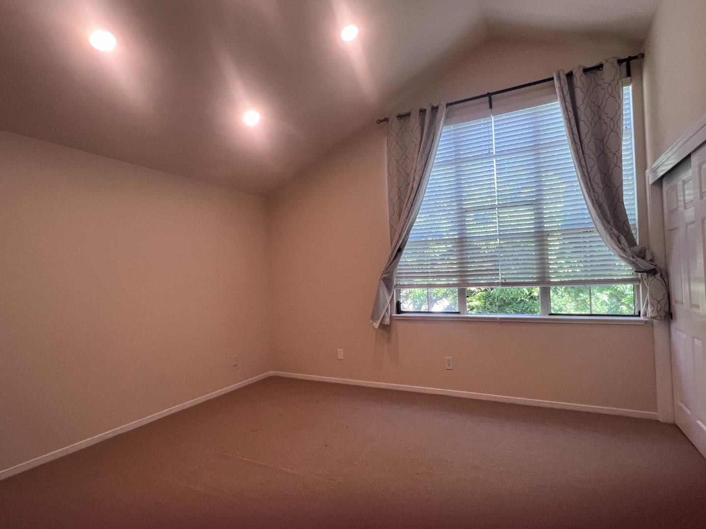 110 Whits Road Mountain View, CA 94040 - Photo 25 of 33 an empty room with windows