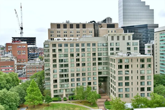 a view of a building with a garden