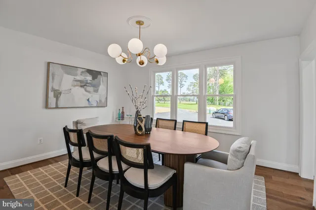 a bathroom with a shower a toilet and sink