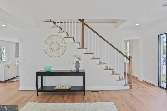 a bathroom with a sink vanity granite and a mirror