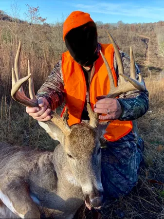 a bathroom with a shower and a sink