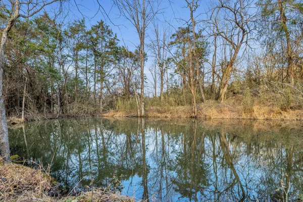 a view of lake with mountain