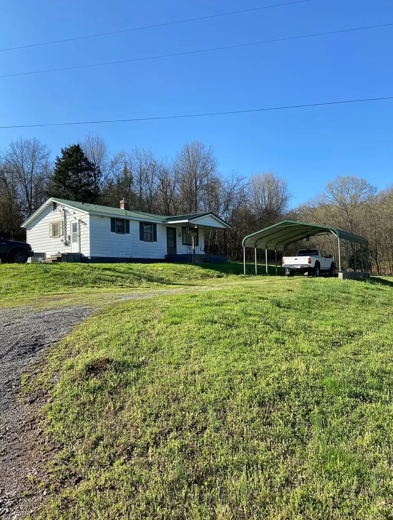 0 Fishing Ford Road Belfast, TN 37019 - Photo 65 of 70 a view of a house with a yard and sitting area