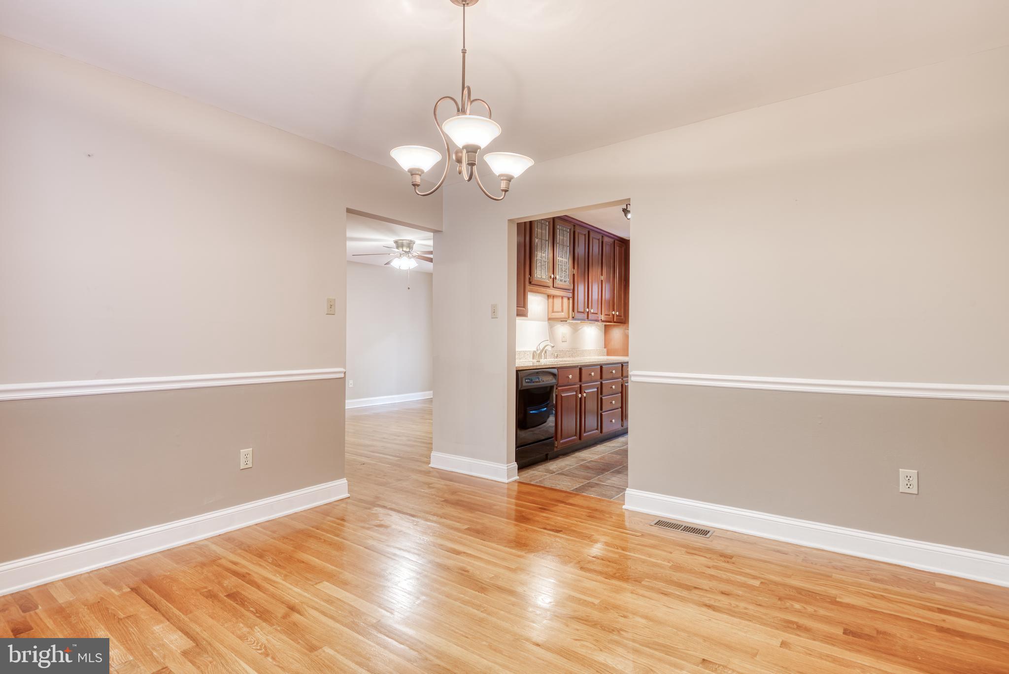 1480 Bollinger Road Westminster, MD 21157 - Photo 16 of 58 Chair rail provides nice finish for dining room.