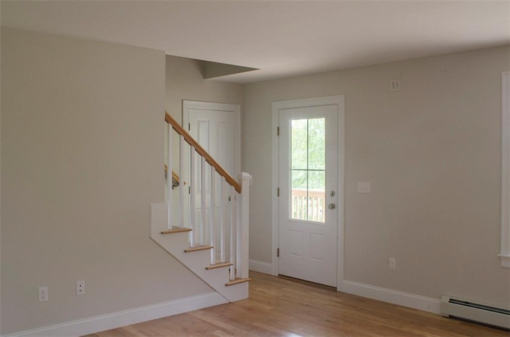 6 Burgess Farm Road Freeport, ME 04032 - Photo 15 of 35 Living area opens to farmer's porch.