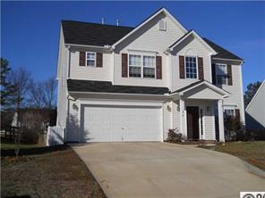 1314 Piney Church Road Concord, NC 28025 - Photo 1 of 6 a front view of a house with a yard and garage