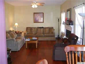1314 Piney Church Road Concord, NC 28025 - Photo 6 of 6 a living room with furniture and wooden floor