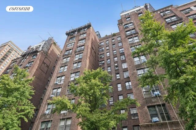 a room with a bench and a window