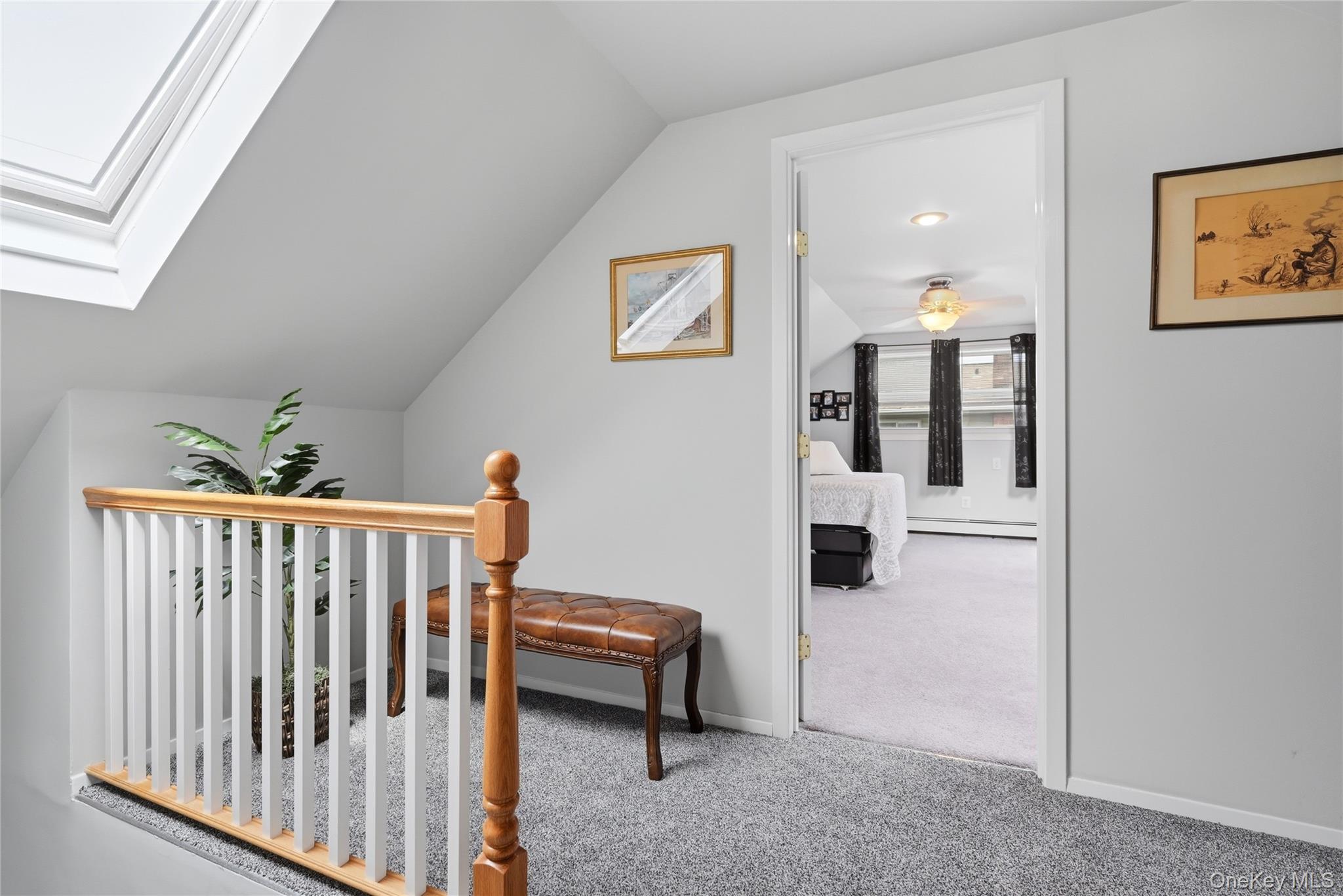 41 Lane Street Lindenhurst, NY 11757 - Photo 23 of 35 Alternate view of second floor landing with skylight