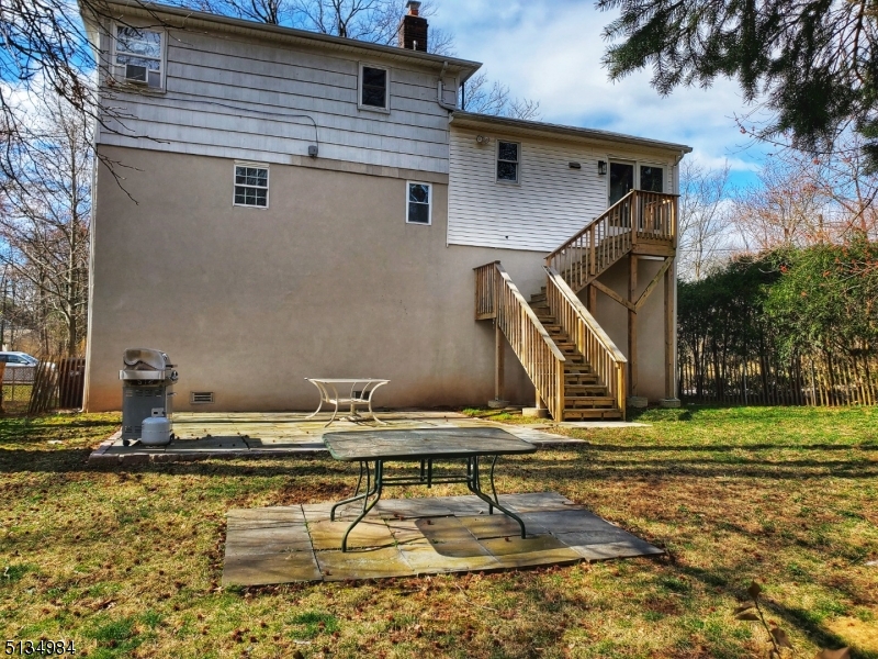 512 Riverside Drive Cranford, NJ 07016 - Photo 12 of 22 a backyard of a house with lots of green space